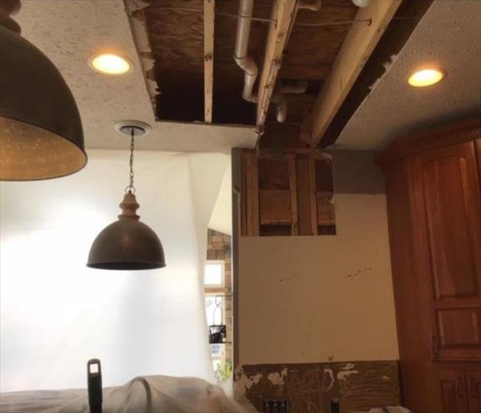 ceiling removed in kitchen after water damage