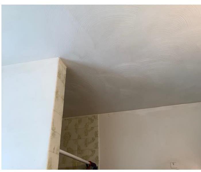 soot removed from white bathroom walls