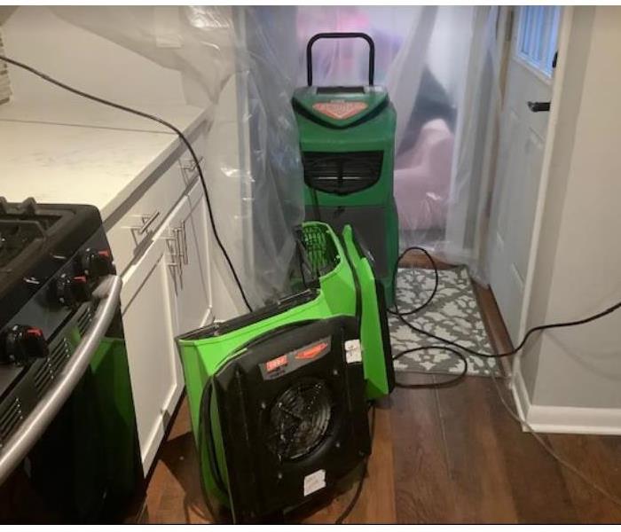 equipment set in residential kitchen after water damage